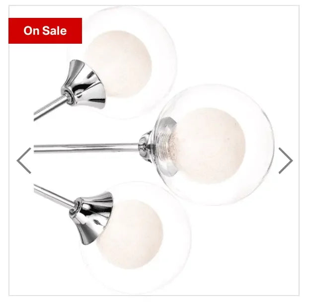 Modern glass globe chandelier with chrome finish and three frosted bulbs, on sale